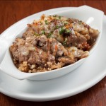Pork Shoulder Steak and Dirty Rice Bake