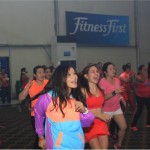 Vibrant and fluorescent ensemble matches the mood of the crowd.