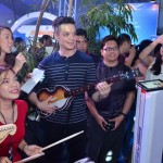 Bamboo plays Rockband with Tattoo Booth guests.